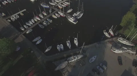 A high fly-over of a small marina on a european lake Video stock 63922913