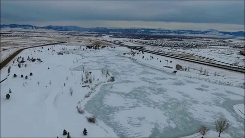 High Fly Over Winter Frozen Lake 1080 Edited Stock Footage 75333689