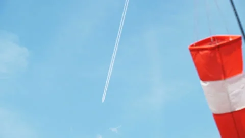 High-flying aircraft with an inversion white trace, and in the foreground - Stock Footage 135959611