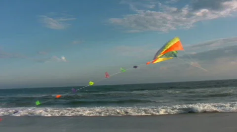 A high flying kite soars in the sky at the beach. Version 2 of 3. Stock Footage 293688