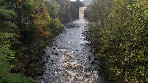 High Force waterfall sorrounded by beautiful autumn colours Stock Footage 264042544