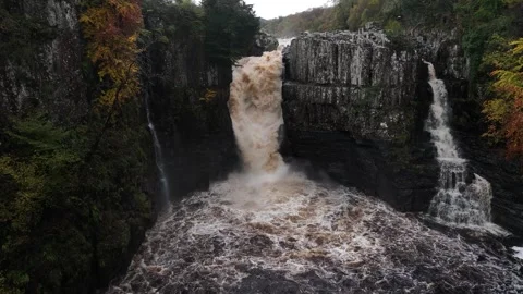 High Force waterfall sorrounded by beautiful autumn colours Stock Footage 264042550