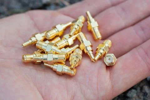 High-frequency SMA connectors isolated on black background. Stock Photos