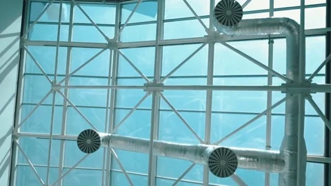High glass ceiling of the building with ventilation pipes Stock Footage 71561131