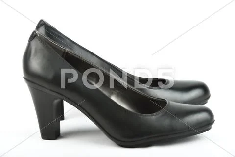 High heel black leather shoe Stock Photos