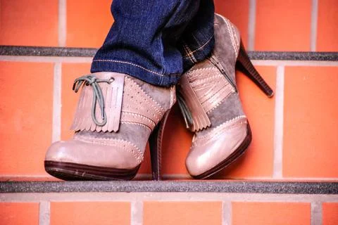 High heels standing on brick steps Stock Photos