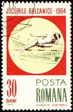 High jump on post stamp Foto stock