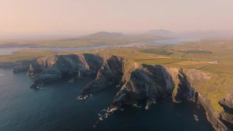 High Kerry Cliffs And Patchwork Fields In Soft Evening Light, Aerial Fly Past Stock Footage 342736631