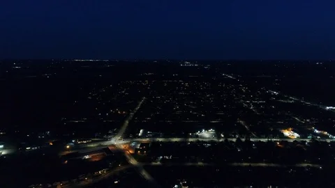 High Left To Right Pan Over City Skyline Nightlights At Dusk With Blue Sky Stock Footage 121204326