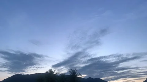 High-level clouds dancing above an evening sunset Stock Footage 226358276