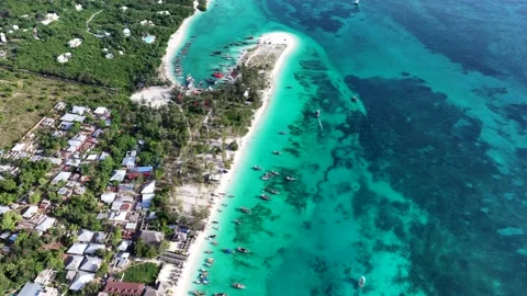 High level flight along beach and coastline of Kendwa  Stock Footage 289063867
