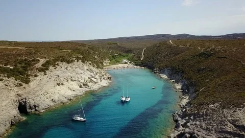High Level Flight Over Mediterranean Sea With Coast, Sardinia, Bay Sailboats Stock Footage 88034868
