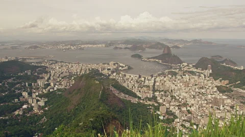 High level view of Inner City with Sugar Loaf and Maracana Football Stadium Stock Footage 64864890