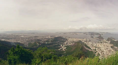 High level view of Inner City with Sugar Loaf and Maracana Football Stadium Stock Footage 64864898