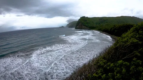 High-level view of Pololu Valley, Big Island Hawaii on a stormy afternoon 4K Stock Footage 98425476