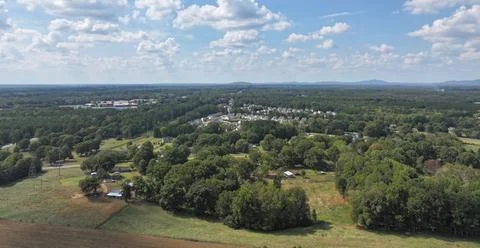 High Level Wide View Of Many Trees And Some Buildings Far Off Stock Photos