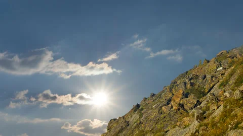 High mount slope in a clouds time lapse scene Stock Footage 178903825