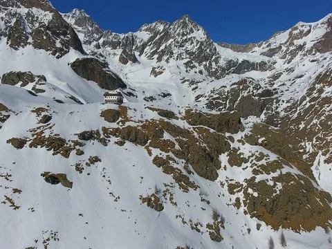 High mountain and refuge alpine - Aerial view Stock Footage 73536708