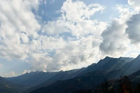High mountain and sky with clouds in autumn. Beautiful landscape.. Stock Photos
