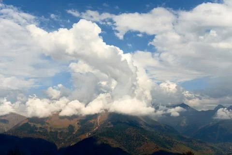 High mountain and sky with clouds in autumn. Beautiful landscape Stock Photos