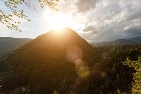 High mountain and sun rays Stock Photos
