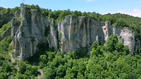 High mountain cliffs surrounded by forest Stock Footage 278226930