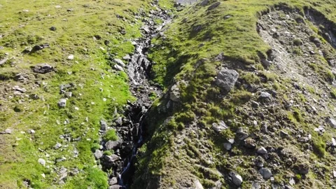 High mountain landscape with water stream near Transfagarasan road Stock Footage 194533285