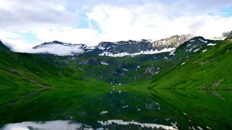 High mountain mirror lake timelapse 스톡 동영상 65774161