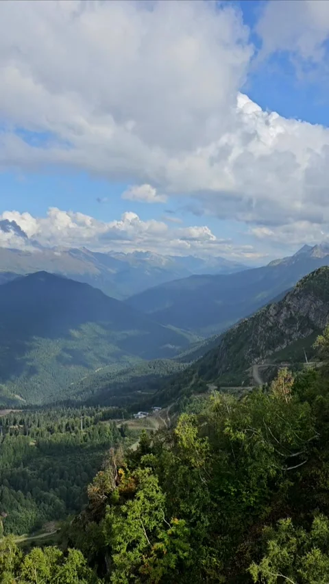 High Mountain Peaks and Cloudy Sky Viewed from Cable Car Stock Footage 330586381