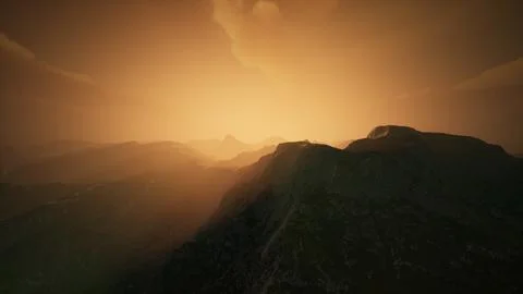 High mountain peaks covered with dramatic heavy fog Illustrazione stock