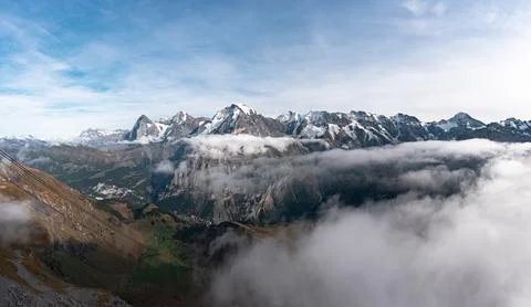 High mountain peaks range covered with snow in Switzerland Stock Photos