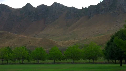 High mountain ranges against the sky in the evening Stock Footage 131773560