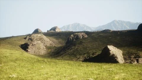 High mountain summer landscape and meadow with huge stones among the grass Stock Illustration
