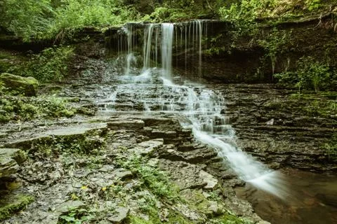 High mountain waterfall Stockfoto's