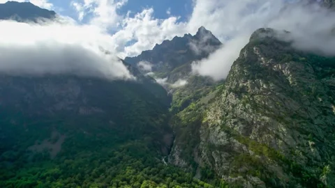 High mountains above the clouds, low clouds in the North Caucasus mountains Stock Footage 291959937