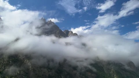 High mountains above the clouds, low clouds in the North Caucasus mountains Stock Footage 291960198