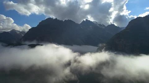 High mountains above the clouds, low clouds in the North Caucasus mountains Stock Footage 291960425