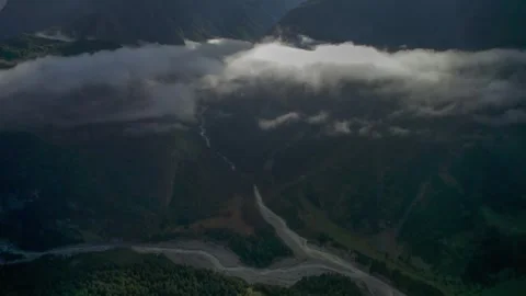 High mountains above the clouds, low clouds in the North Caucasus mountains Stock Footage 291960449