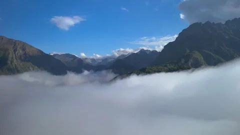 High mountains above the clouds, low clouds in the North Caucasus mountains Stock Footage 291960844