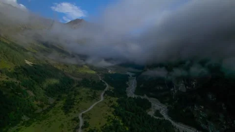 High mountains above the clouds, low clouds in the North Caucasus mountains Stock Footage 291960959