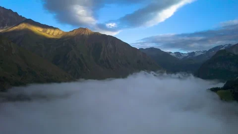 High mountains above the clouds, low clouds in the North Caucasus mountains Stock Footage 291961151