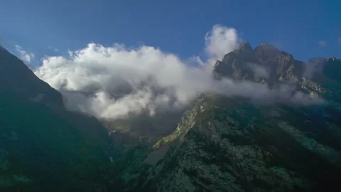 High mountains above the clouds, low clouds in the North Caucasus mountains Stock Footage 291969096