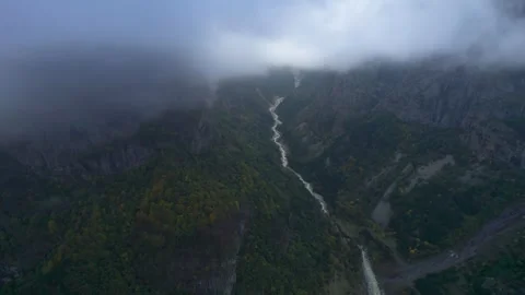 High mountains above the clouds, low clouds in the North Caucasus mountains Stock Footage 291969099