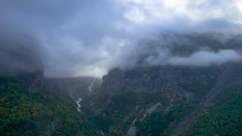 High mountains above the clouds, low clouds in the North Caucasus mountains Stock Footage 291996866