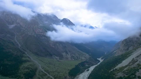 High mountains above the clouds, low clouds in the North Caucasus mountains Stock Footage 291997873