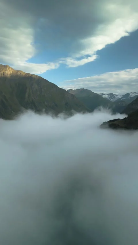 High mountains above the clouds, low clouds in the North Caucasus mountains Stock Footage 291998610