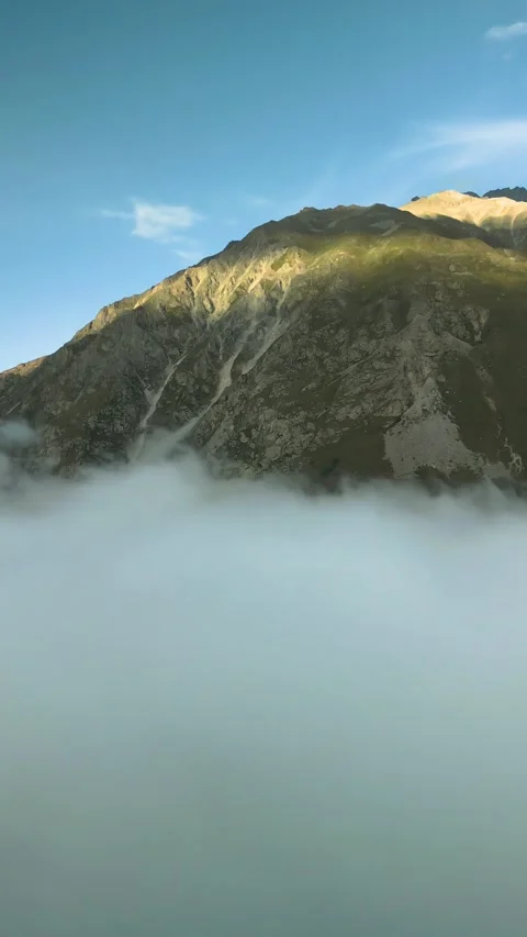 High mountains above the clouds, low clouds in the North Caucasus mountains Stock Footage 291998633