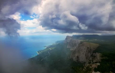 High mountains in the clouds Stock Photos
