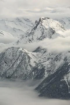 High mountains in clouds Stock Photos