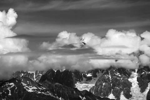 High Mountains covered with clouds Stock Photos